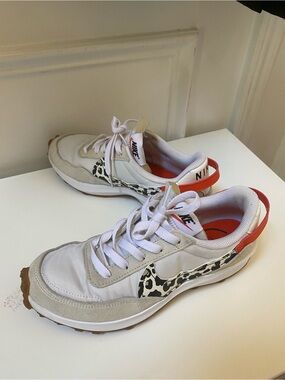 Like NEW Nike Women’s White & Red Leopard-Accent Sneakers size 7